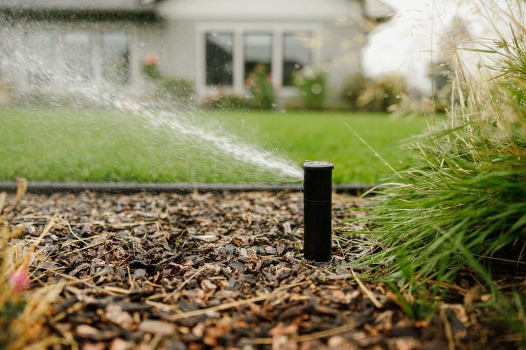 blowing out sprinklers Colonial Lawn & Garden